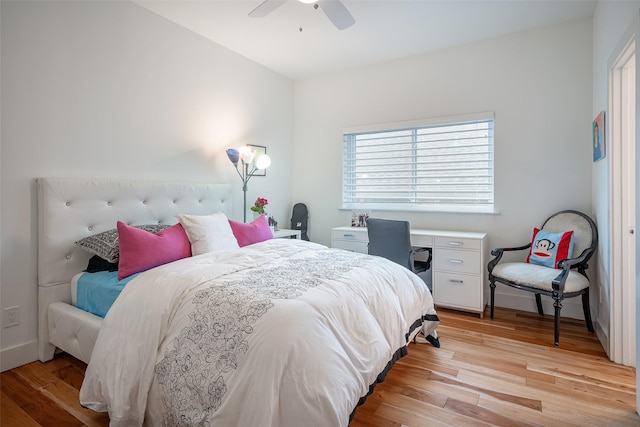 bedroom featuring ceiling fan and light hardwood / wood-style floors