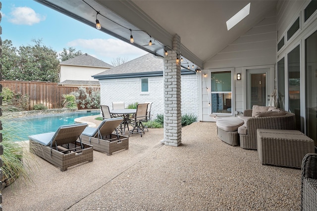 view of patio / terrace featuring a fenced in pool and an outdoor hangout area