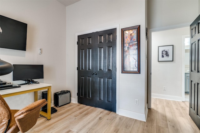 office space with light wood-type flooring