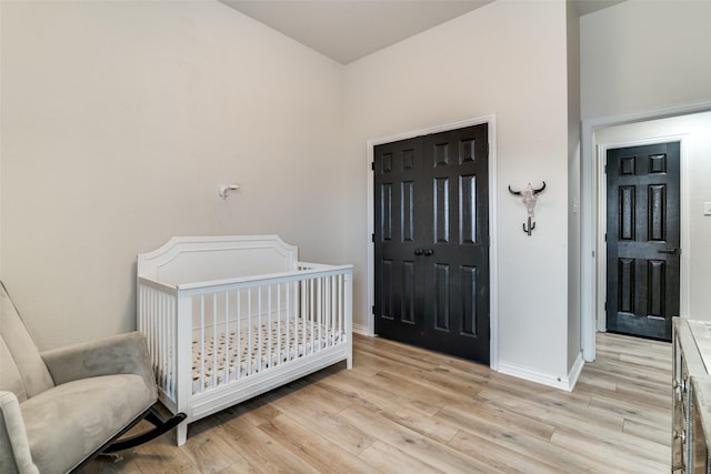 bedroom with light hardwood / wood-style flooring