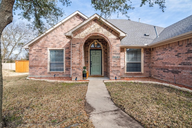 view of front of home with a front lawn