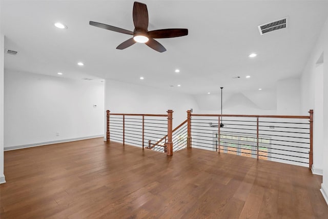 spare room with recessed lighting, visible vents, ceiling fan, and wood finished floors