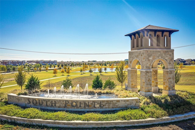 view of community with a water view