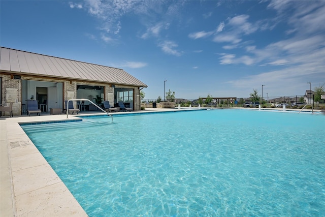 view of pool with a patio