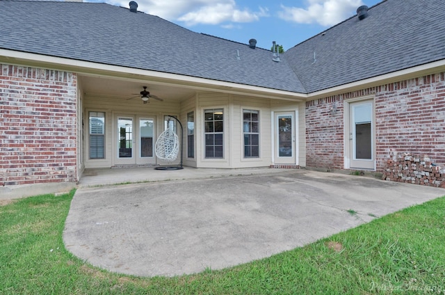 exterior space featuring ceiling fan