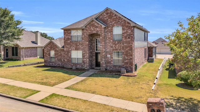 view of front property with central AC and a front lawn