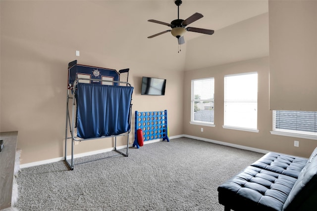 sitting room featuring ceiling fan and carpet