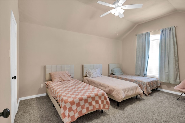 carpeted bedroom featuring lofted ceiling and ceiling fan