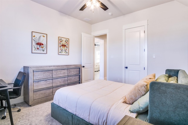 bedroom with light colored carpet and ceiling fan