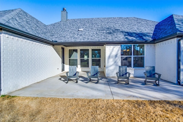 back of property with a patio area