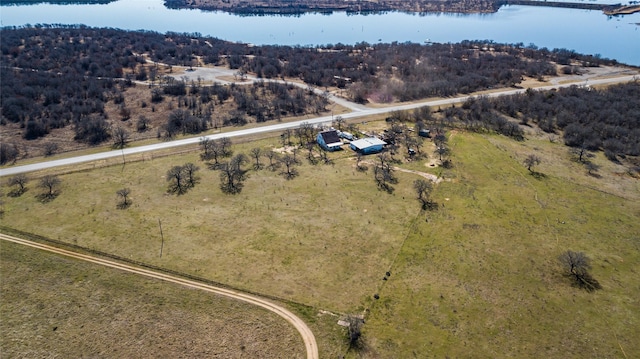 bird's eye view with a water view and a rural view