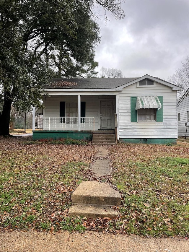 view of front of home featuring covered porch