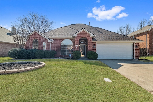 ranch-style house featuring a garage and a front lawn