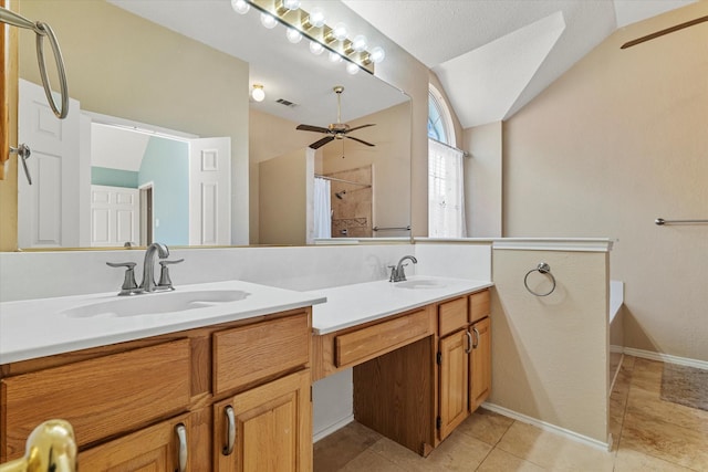 bathroom featuring vaulted ceiling, plus walk in shower, vanity, ceiling fan, and tile patterned floors