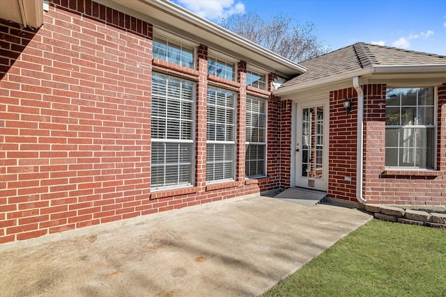 doorway to property with a patio