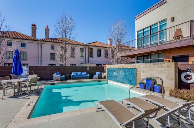 view of swimming pool with an outdoor hangout area and a patio