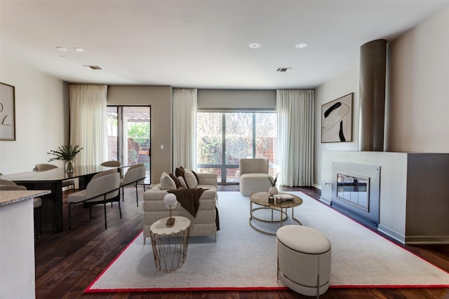 living room with dark wood-type flooring