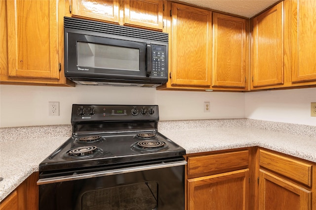 kitchen with black appliances