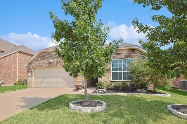 view of front of home with a garage and a front yard