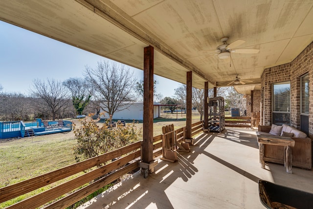 view of patio / terrace featuring ceiling fan