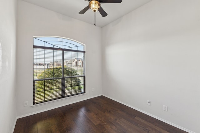 spare room with ceiling fan and wood-type flooring