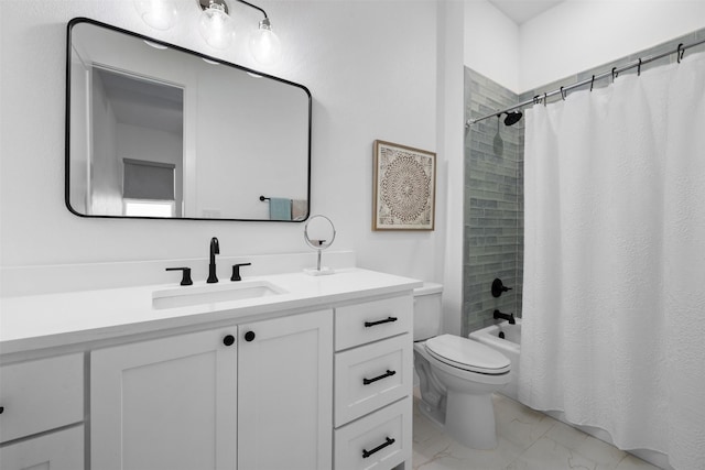 full bathroom featuring shower / tub combo with curtain, vanity, and toilet