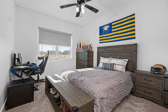 bedroom with light carpet and ceiling fan