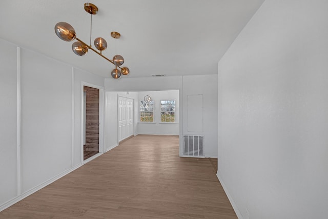 hallway featuring hardwood / wood-style floors