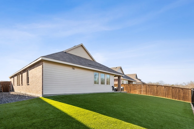 view of property exterior featuring a yard