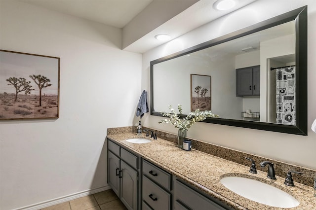 bathroom featuring tile patterned floors and vanity