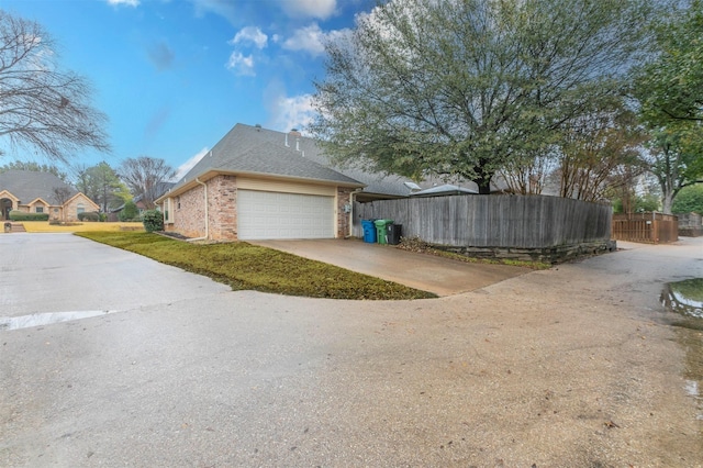 view of home's exterior with a garage