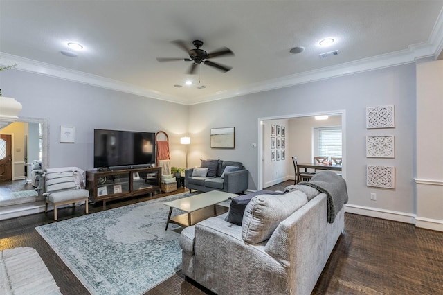 living room featuring ornamental molding, dark hardwood / wood-style floors, and ceiling fan