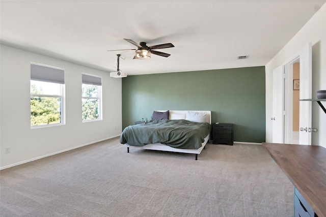 bedroom with light carpet