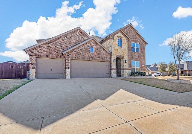 view of front of property featuring a garage