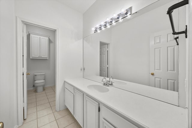 1527 Murphy Dr, Rockwall, TX 75087 - bathroom featuring toilet, baseboards, and tile patterned flooring