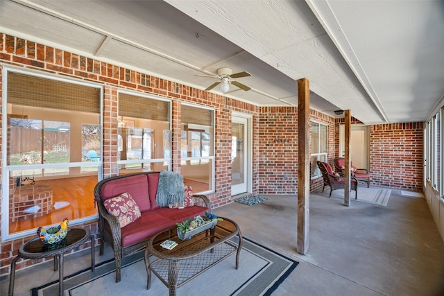 view of patio featuring ceiling fan