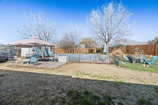 view of yard with a gazebo and a deck