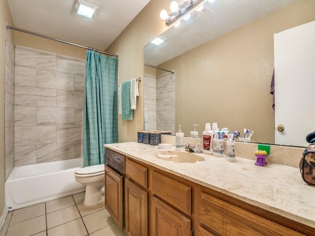 full bathroom featuring tile patterned floors, toilet, vanity, and shower / bath combo