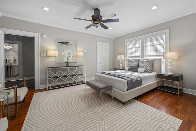 bedroom featuring crown molding, ceiling fan, and hardwood / wood-style flooring