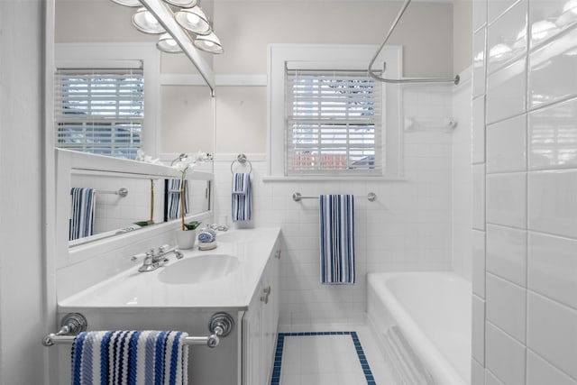 bathroom featuring vanity, tile walls, and tile patterned floors