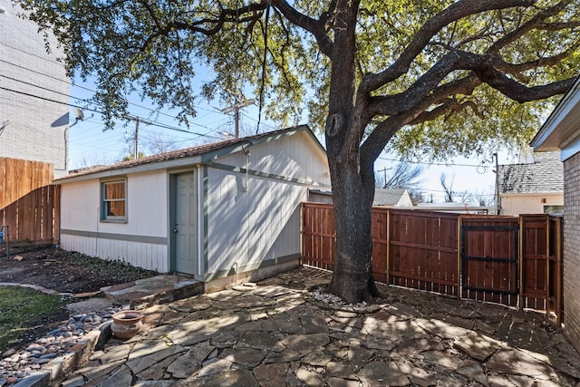 view of side of property with a patio