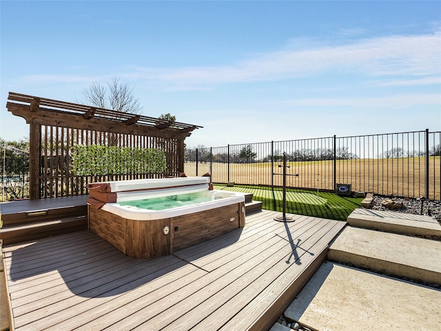 wooden terrace featuring a pergola and a covered hot tub