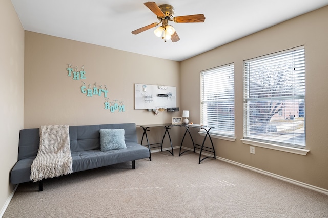 office space featuring carpet floors and ceiling fan