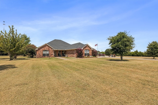 view of front of property with a front lawn