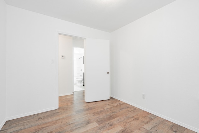 unfurnished room featuring light hardwood / wood-style flooring