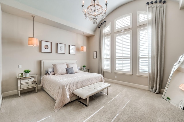 bedroom with a chandelier, carpet floors, and multiple windows