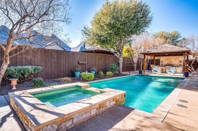 view of pool with a gazebo, an in ground hot tub, and a patio