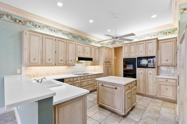 kitchen with ornamental molding, a center island, kitchen peninsula, and black appliances