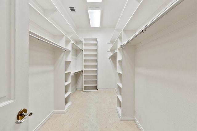 walk in closet featuring visible vents