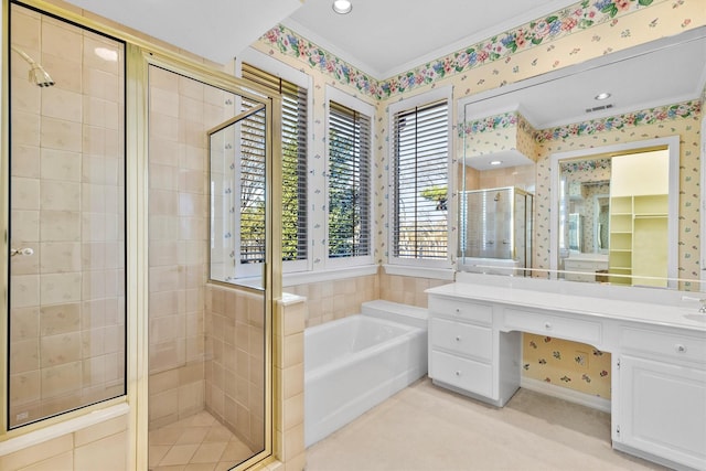 bathroom featuring visible vents, vanity, a shower stall, a bath, and wallpapered walls